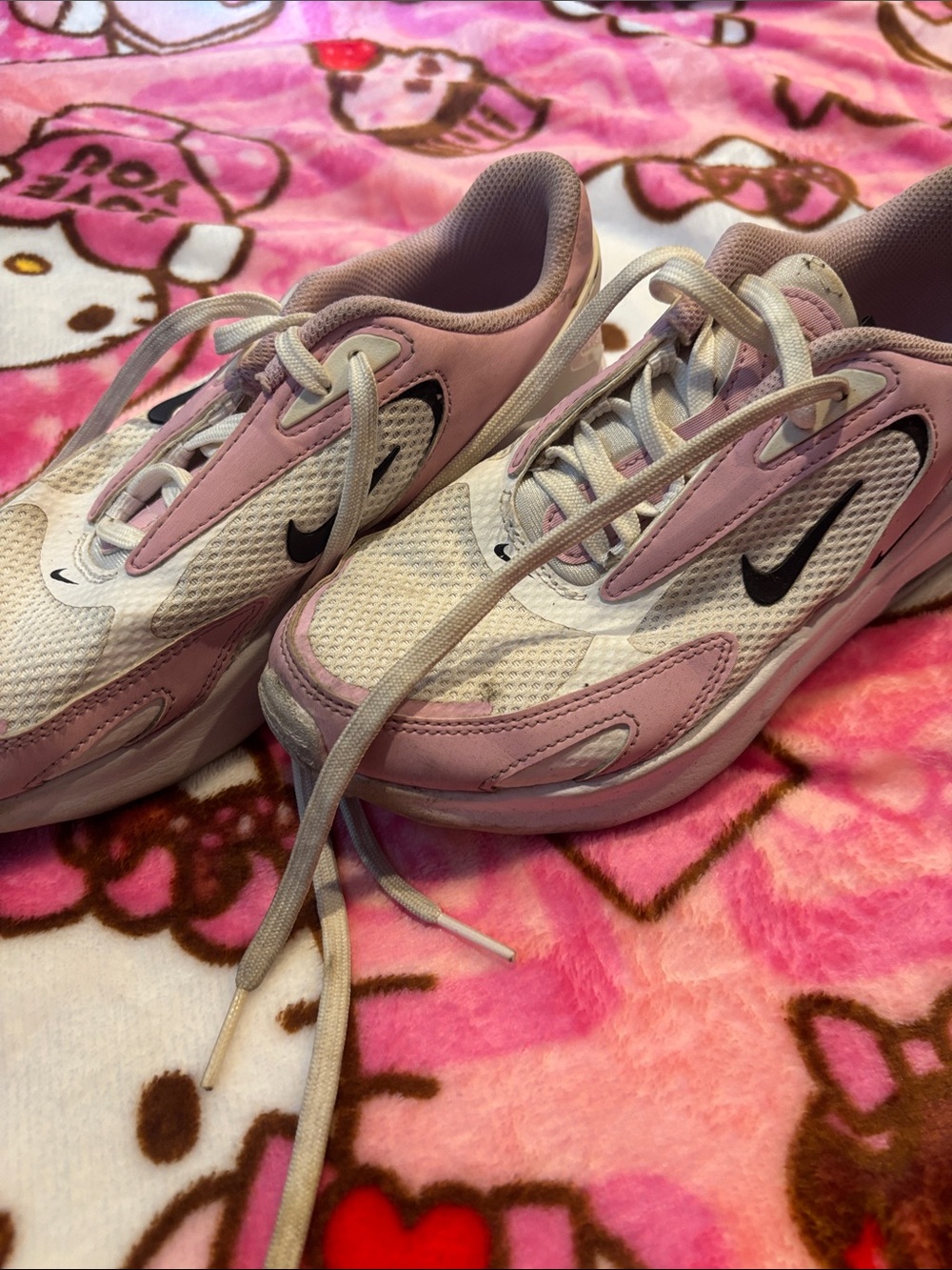 Nike Women’s Pink, White and Black Mesh Athletic Sneakers